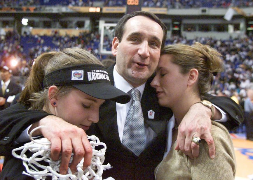 Krzyzewski celebrates with his daughters Jamie, left, and Lindy after Duke won its third national championship in 2001.