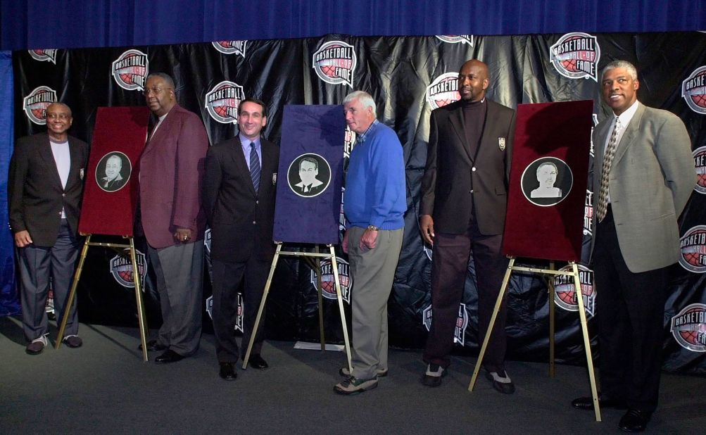 In 2001, Krzyzewski was inducted into the Basketball Hall of Fame. He was joined by his old coach Bob Knight, who introduced him during the ceremony. Other inductees that year were John Chaney, far left, and Moses Malone, second from right.