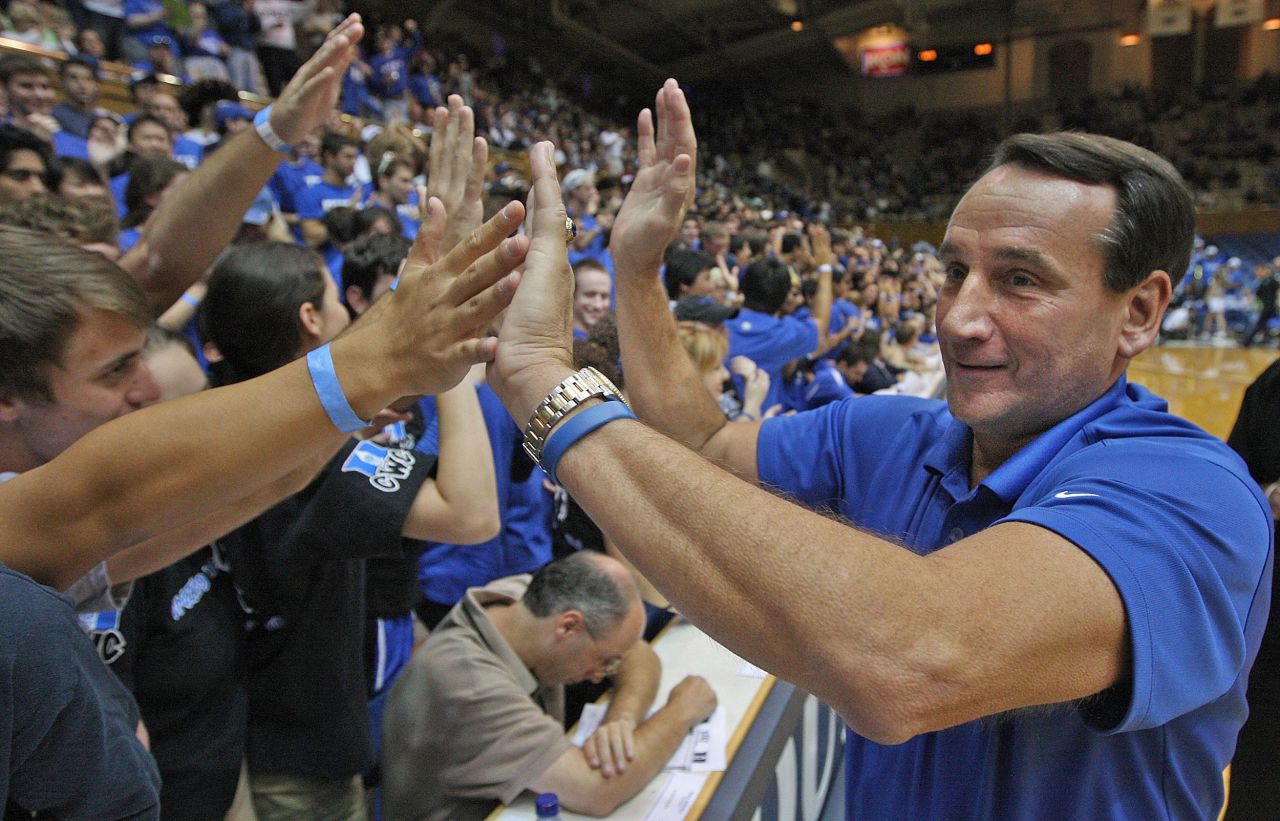 Krzyzewski greets the "Cameron Crazies"  before Duke's annual Blue-White game in 2008.