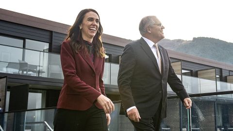 New Zealand's Prime Minister Jacinda Ardern walks with Australia's Prime Minister Scott Morrison ahead of the Australia-New Zealand Leaders' Meeting in Queenstown on May 31, 2021. 