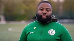 Grenfell Athletic FC's Head-Coach Rupert Taylor poses for a photograph during a football training session at Paddington Recreational Ground in north London on April 15, 2021. - The Grenfell Athletic team badge is a symbol of what "a community had and lost" when a blaze ripped through a London tower block four years ago, killing scores of residents. Britain's deadliest domestic fire since World War II left 72 people dead, with an official report blaming highly combustible cladding fixed to the 24-storey block as the principal reason the inferno spread. "The purpose of a dragon, if you look up its history, is protecting precious items or treasures," Grenfell Athletic founder Rupert Taylor told AFP. - TO GO WITH AFP STORY BY Pirate IRWIN (Photo by Niklas HALLE'N / AFP) / TO GO WITH AFP STORY BY Pirate IRWIN (Photo by NIKLAS HALLE'N/AFP via Getty Images)