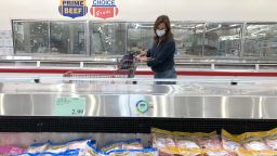 A customer shops for meat at a Costco store on May 24, 2021 in Novato, California. According to a Morning Consult survey of 2,200 adult shoppers, one-third of those surveyed say that they are paying more for groceries, especially red meat and chicken. 
