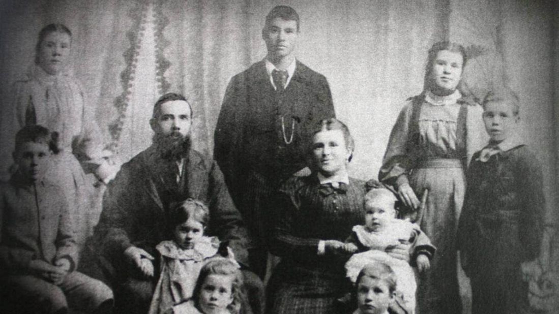 <strong>Growing family:</strong> They are pictured in 1897 with children (left to right, standing) Alice, George Junior, Ada and Charles, and (sitting, left to right) Henry, Ivy, Rose, Elwyn and Jane (sitting on Emily's knee). 