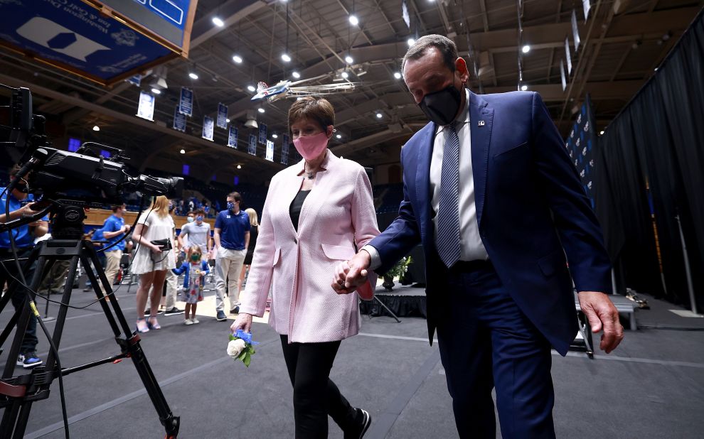 Krzyzewski and his wife, Mickie, leave a news conference after he announced his retirement plans in 2021.