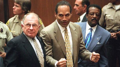 O.J. Simpson (C) listens to the not guilty verdict with his attorneys F. Lee Bailey (L) and Johnnie Cochran Jr (R). Simpson was found not guilty of killing his ex-wife Nicole Brown-Simpson and her friend Ron Goldman.