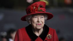 PORTSMOUTH, ENGLAND - MAY 22: Queen Elizabeth II during a visit to HMS Queen Elizabeth at HM Naval Base ahead of the ship's maiden deployment on May 22, 2021 in Portsmouth, England. The visit comes as HMS Queen Elizabeth prepares to lead the UK Carrier Strike Group on a 28-week operational deployment travelling over 26,000 nautical miles from the Mediterranean to the Philippine Sea. (Photo by Steve Parsons - WPA Pool / Getty Images)