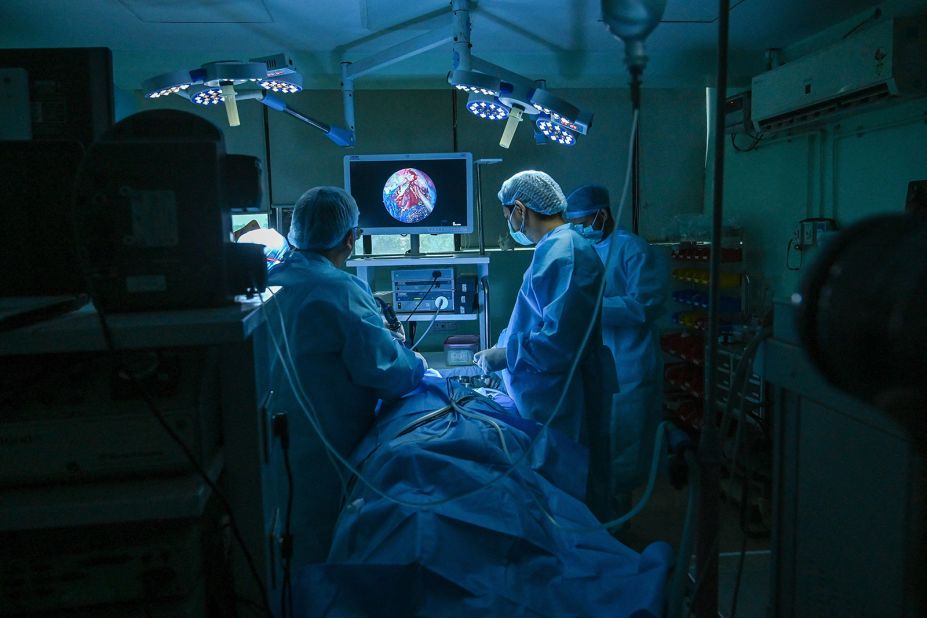 Dr. Brajpal Singh Tyagi, left, performs surgery to remove mucormycosis, a rare and potentially deadly infection also known as black fungus, from a patient in Ghaziabad, India, on June 1. In the past few weeks, <a href="index.php?page=&url=https%3A%2F%2Fwww.cnn.com%2F2021%2F05%2F21%2Findia%2Fblack-fungus-mucormycosis-covid-explainer-intl-hnk%2Findex.html" target="_blank">thousands of black fungus cases</a> have been reported across the country, with hundreds hospitalized and dozens dead. Many of those being infected are coronavirus patients or those who have recently recovered from Covid-19 and have weakened immune systems. 