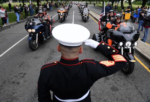Veteran Tim Chambers salutes motorcyclists participating in the "Rolling to Remember" event that was held in Washington, DC, on Sunday, May 30. <a href="http://www.cnn.com/2021/05/28/us/gallery/memorial-day-weekend-scenes/index.html" target="_blank">In pictures: How Americans spent their Memorial Day weekend</a>