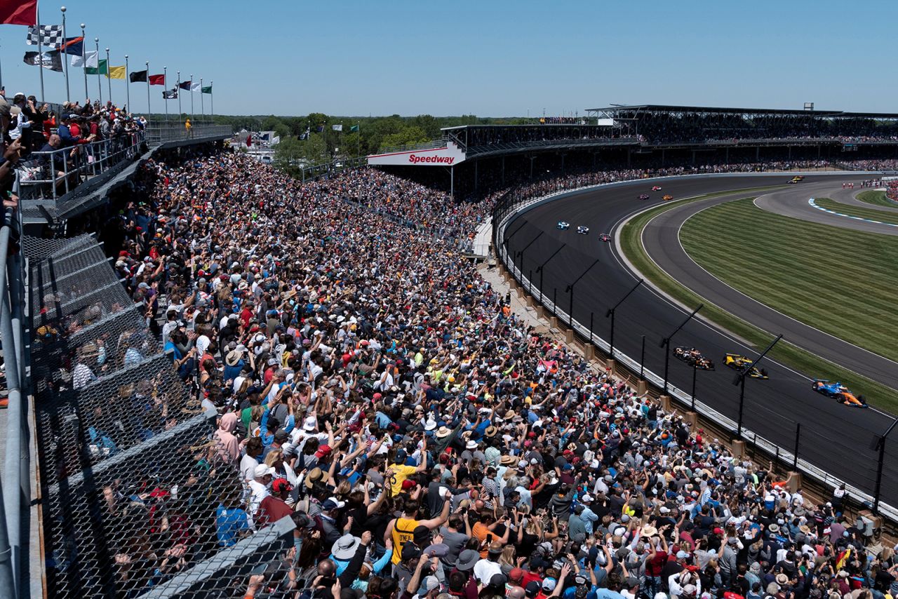 A crowd watches the first lap of the Indianapolis 500 on Sunday, May 30.<a href="https://www.cnn.com/2021/05/30/us/indy-500-winner-trnd/index.html" target="_blank"> This year's race</a> was billed as the most-attended sporting event since the start of the Covid-19 pandemic, with 135,000 tickets quickly selling out. Helio Castroneves won the race for the fourth time in his career.
