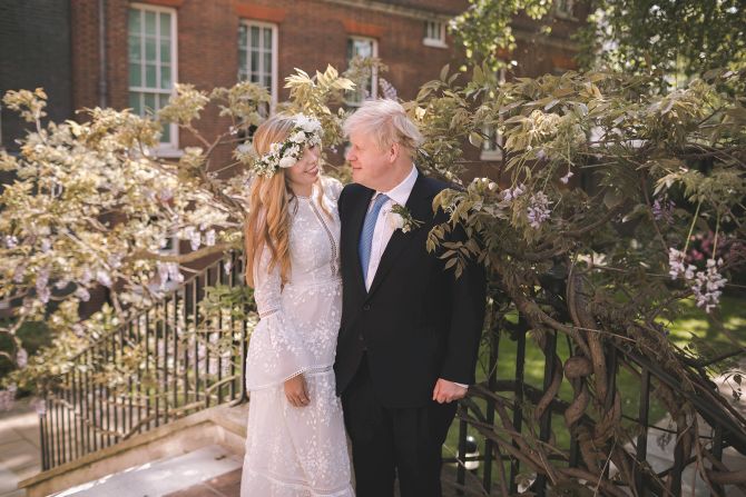 Johnson is seen with his wife, Carrie, after <a href="index.php?page=&url=https%3A%2F%2Fwww.cnn.com%2F2021%2F05%2F29%2Fworld%2Fboris-johnson-marries-carrie-symonds-intl%2Findex.html" target="_blank">their wedding</a> at London's Westminster Cathedral in May 2021. The ceremony, described by PA Media as a "secret wedding," was reportedly held in front of close friends and family, according to several British newspaper accounts.