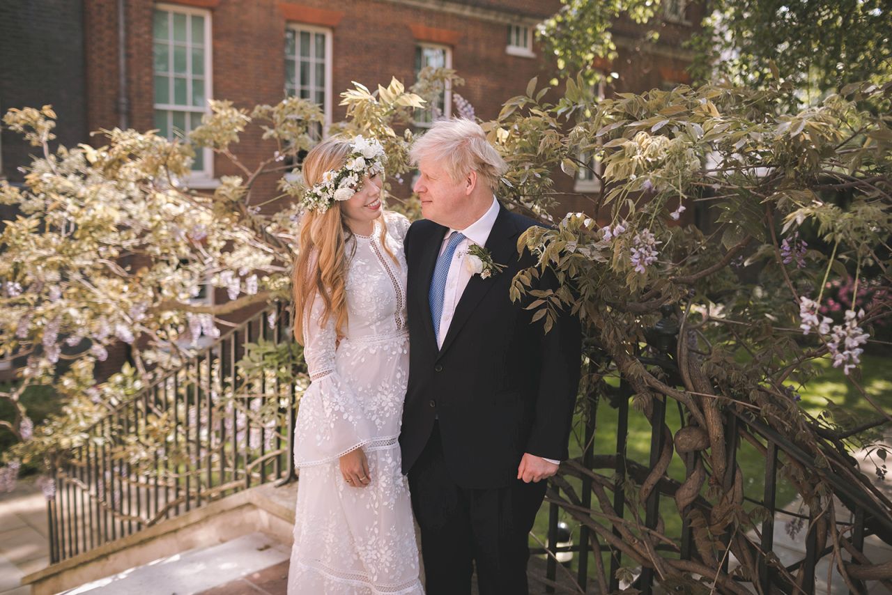 Johnson is seen with his wife, Carrie, after <a href="https://www.cnn.com/2021/05/29/world/boris-johnson-marries-carrie-symonds-intl/index.html" target="_blank">their wedding</a> at London's Westminster Cathedral in May 2021. The ceremony, described by PA Media as a "secret wedding," was reportedly held in front of close friends and family, according to several British newspaper accounts.