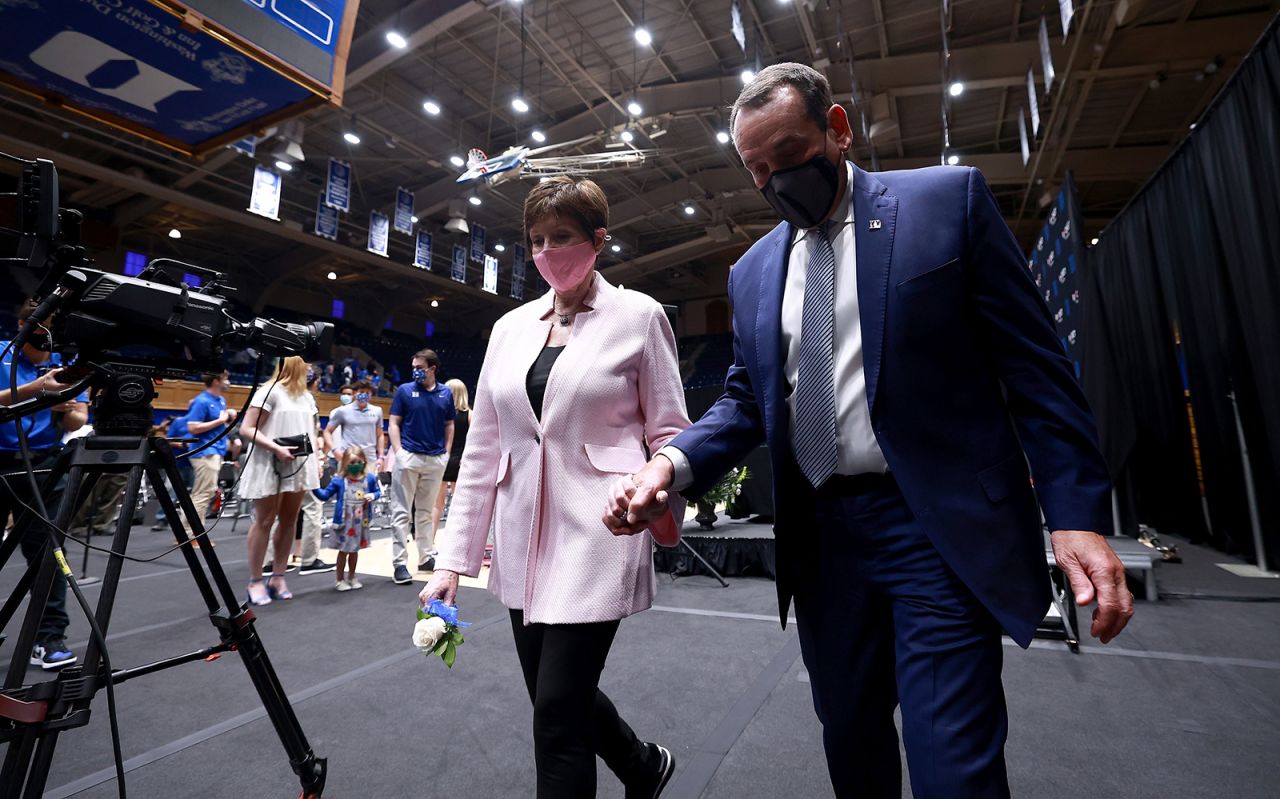 Duke basketball coach Mike Krzyzewski and his wife, Mickie, leave a news conference in Durham, North Carolina, on Thursday, June 3. Krzyzewski, college basketball's all-time winningest coach, <a href="https://www.cnn.com/2021/06/02/us/mike-krzyzewski-duke-coach-retire-spt-trnd/index.html" target="_blank">will be retiring</a> after the 2021-22 season. <a href="https://www.cnn.com/2021/06/02/us/gallery/mike-krzyzewski-career-coach-k/index.html" target="_blank">In pictures: Coach K's legendary career</a>