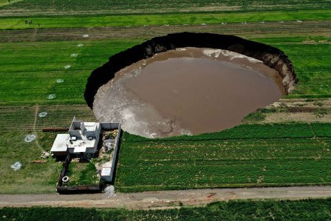 This massive sinkhole, seen on Tuesday, June 1, <a href="https://www.cnn.com/2021/06/02/americas/sinkhole-puebla-mexico-scli-intl/index.html" target="_blank">threatens a house</a> in Santa Maria Zacatepec, Mexico. Officials are investigating how it formed.