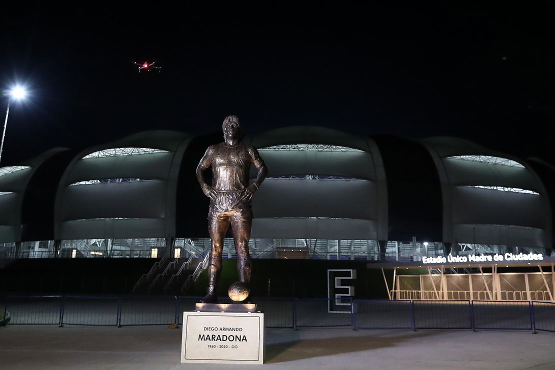 A 16-foot-5-inch tall statue of late football legend Diego Maradona is unveiled at the Estadio Unico Madre de Ciudades.