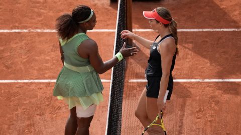 Williams goes to hug Collins after she defeated her in their third-round match.