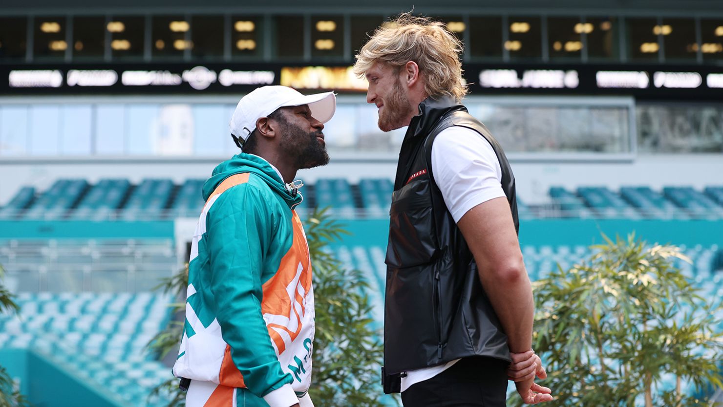 Floyd Mayweather and Logan Paul face off during media availability prior to their June 6 match in Miami Gardens, Florida. 