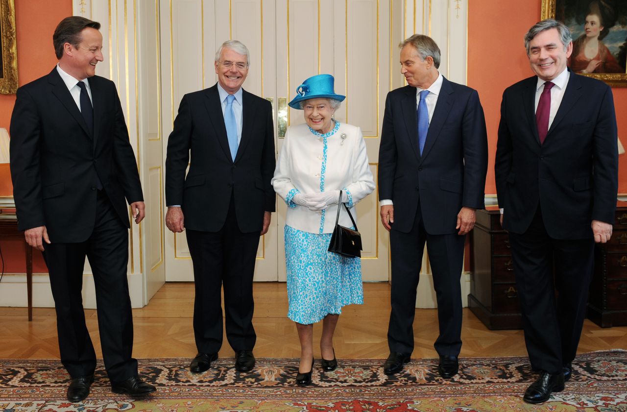 Britain's Queen Elizabeth II poses in 2010 with several of the prime ministers who have served during her reign. With the Queen, from left, are David Cameron, John Major, Tony Blair and Gordon Brown.