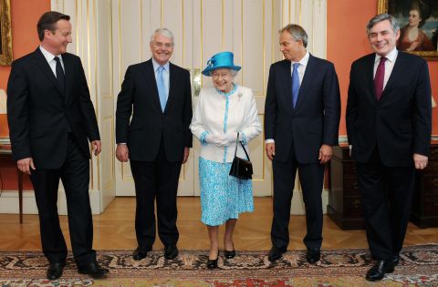 Britain's Queen Elizabeth II poses in 2010 with several of the prime ministers who have served during her reign. With the Queen, from left, are David Cameron, John Major, Tony Blair and Gordon Brown.