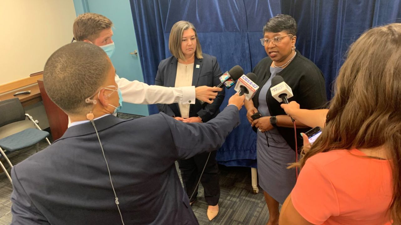 DCPS Superintendent Dr. Diana Greene speaking to reporters after the school board approved the name changes.