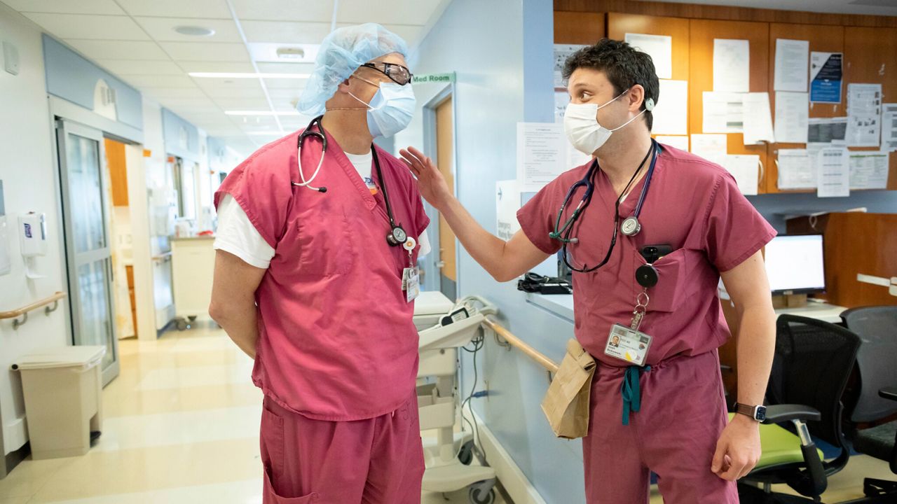 Two staff members of the  Zuckerberg San Francisco General Hospital.