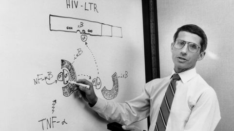 Dr. Anthony Fauci, director of the National Institute of Allergy and Infectious Diseases, talks to his team about HIV/AIDS during a meeting in 1990.