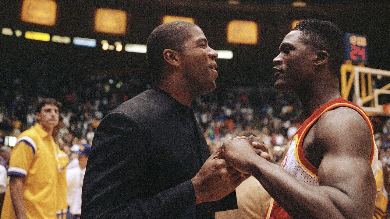 Basketball legend Earvin "Magic" Johnson is pictured at a Los Angeles Lakers game on November 17, 1991, shortly after announcing he had HIV.