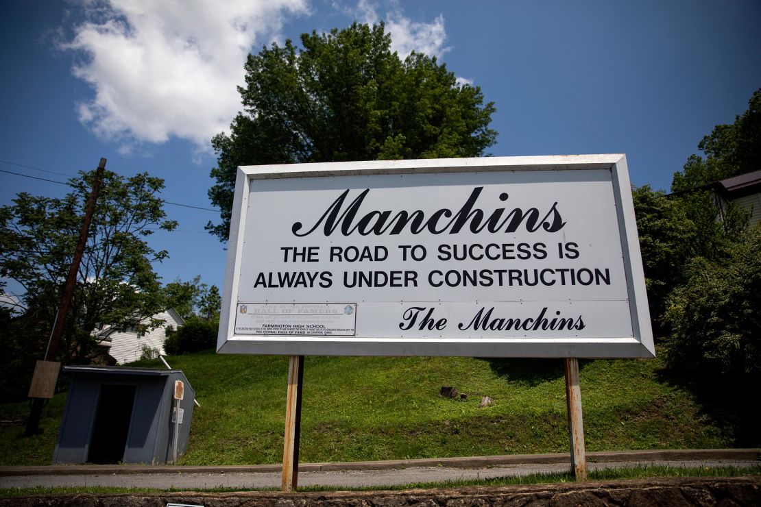 A sign bearing the Manchin name appears in Farmington.