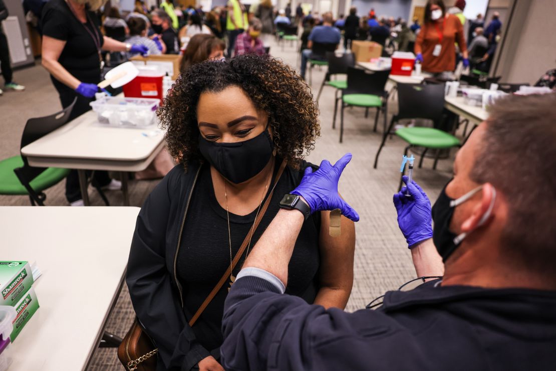 Latiah Haley receives a dose of the Johnson & Johnson vaccine at an event organized by the fire department in Thornton, Colorado, on March 6, 2021.