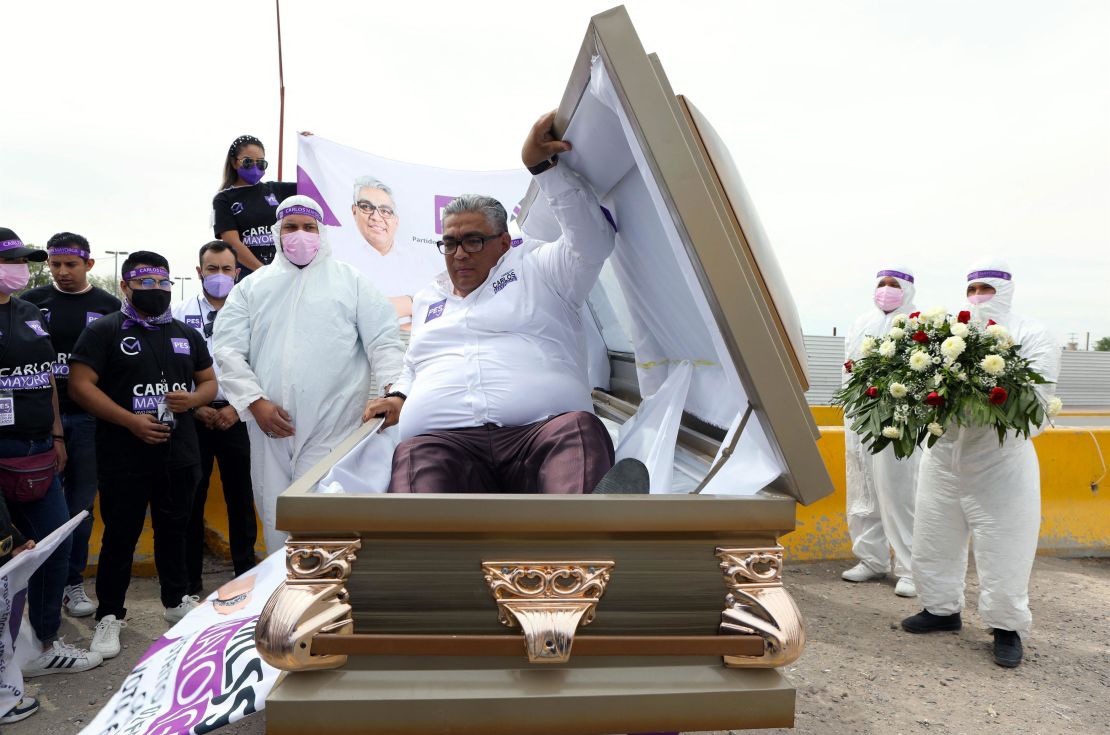 Social Encounter Party candidate Carlos Mayorga launches his campaign inside a coffin.