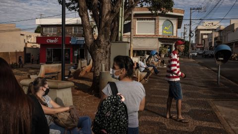 People gather at a park in Serrana, Brazil, on Wednesday, May 26, 2021.