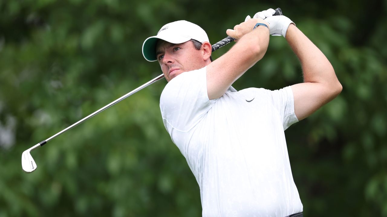 McIlroy plays his shot from the 14th tee during the continuation of the first round of The Memorial Tournament.
