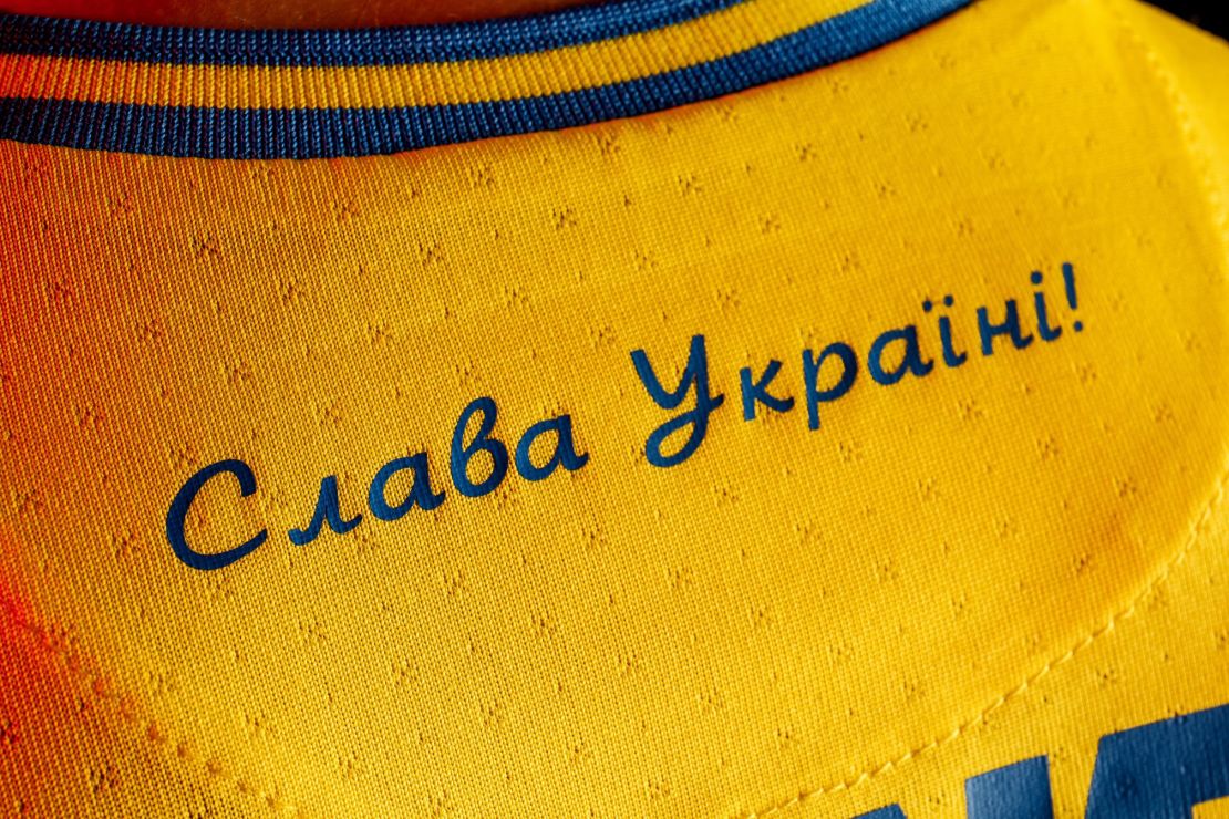 The shirt also features the slogan "Glory to Ukraine."