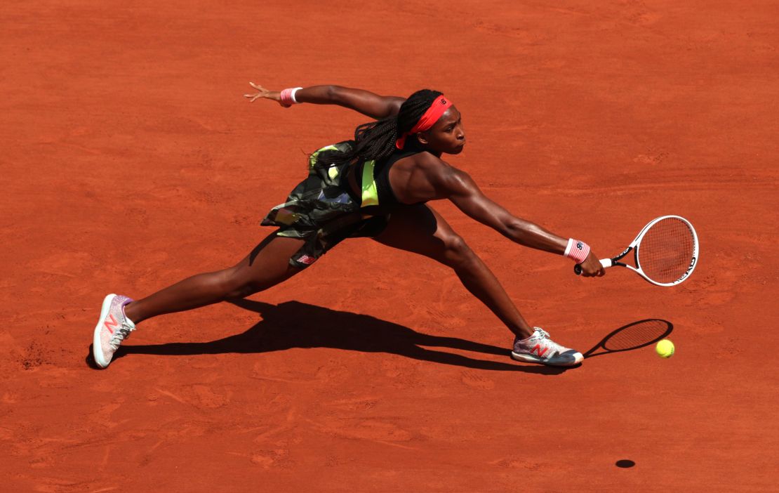 Gauff plays a backhand in her ladies singles fourth round match against Ons Jabeur.