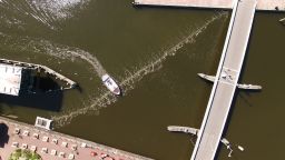 "The Bubble Barrier" was developed as a simple way to stop plastic pollution flowing from waterways into the ocean. Installed in Amsterdam's Westerdok canal, an air compressor sends air through a perforated tube running diagonally across the bottom of the canal, creating a stream of bubbles that traps plastic and guides it to a catchment system. 