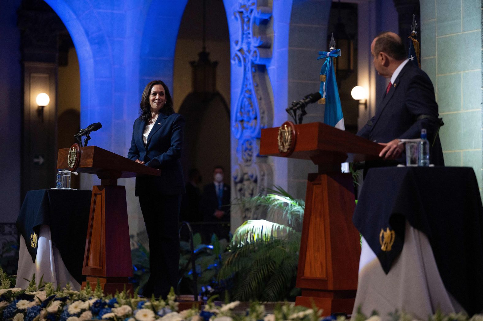 Harris, left, looks on as Guatemalan President Alejandro Giammattei speaks during a press conference at the Palacio Nacional de la Cultura in Guatemala City on June 7.