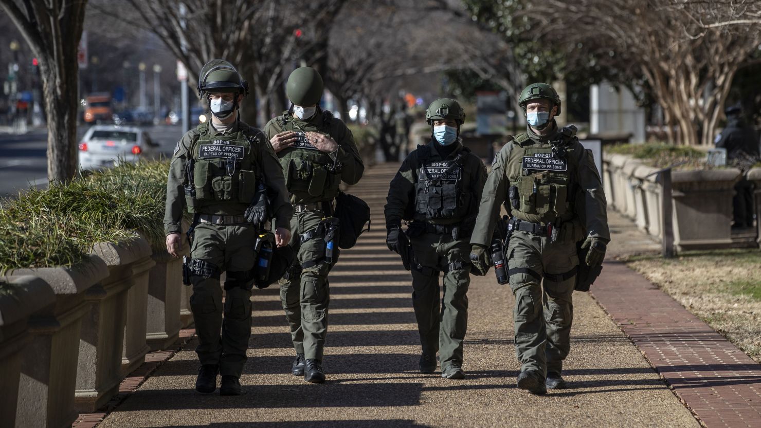 Federal law enforcement officers patrol the streets of Washington on January 7, 2021, the day after the US Capitol riot.