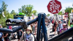A makeshift "black snake" resembling a pipeline was carried as 2,000 indigenous leaders and "water protectors" from around the country marched along Highway 9 in Clearwater County, Minn. on Monday, June 7, 2021 to protest the construction of Enbridge Line 3.
