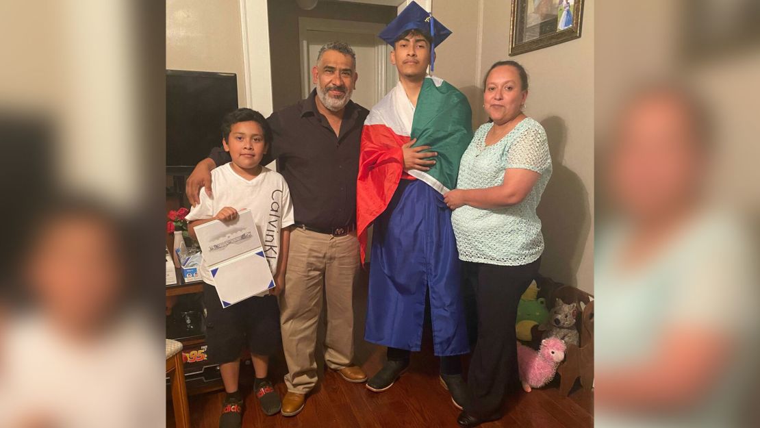 Lopez with his parents and little brother after the graduation.