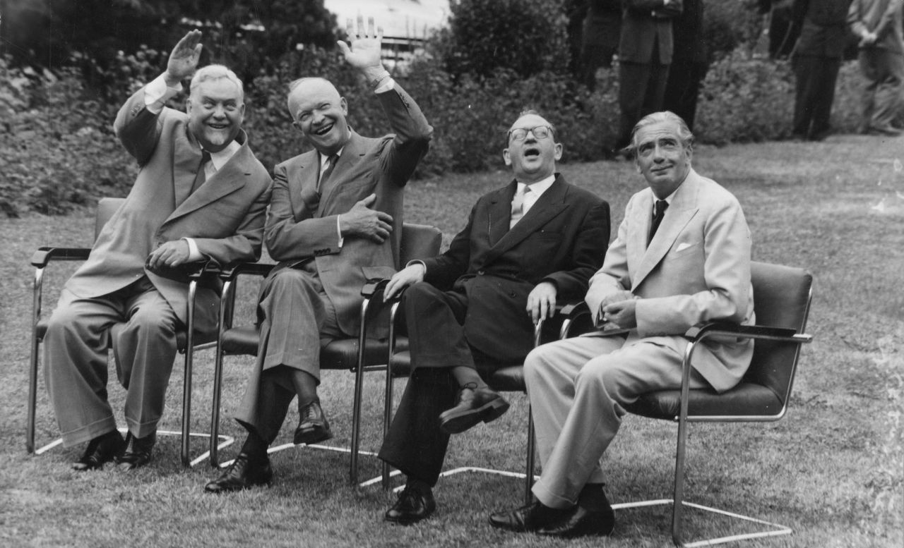 Soviet leader Nikolai Bulganin, left, waves with US President Dwight D. Eisenhower during a summit in Geneva, Switzerland, in 1955. Also taking part in the summit were French Prime Minister Edgar Faure, second from right, and British Prime Minister Anthony Eden, right.