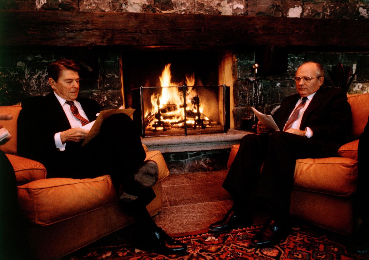 US President Ronald Reagan, left, and Soviet leader Mikhail Gorbachev hold a fireside chat in a boat house during a summit in Geneva, Switzerland, in 1985. Gorbachev ushered in an era of economic reforms under perestroika and greater political freedoms under glasnost.