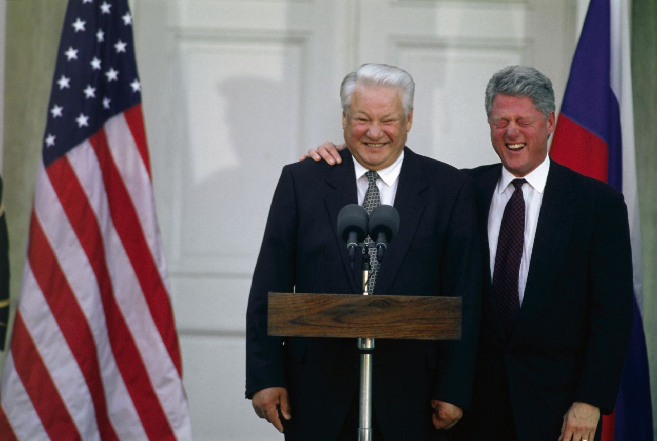 Clinton laughs at a Yeltsin joke during a joint news conference in New York in 1995.