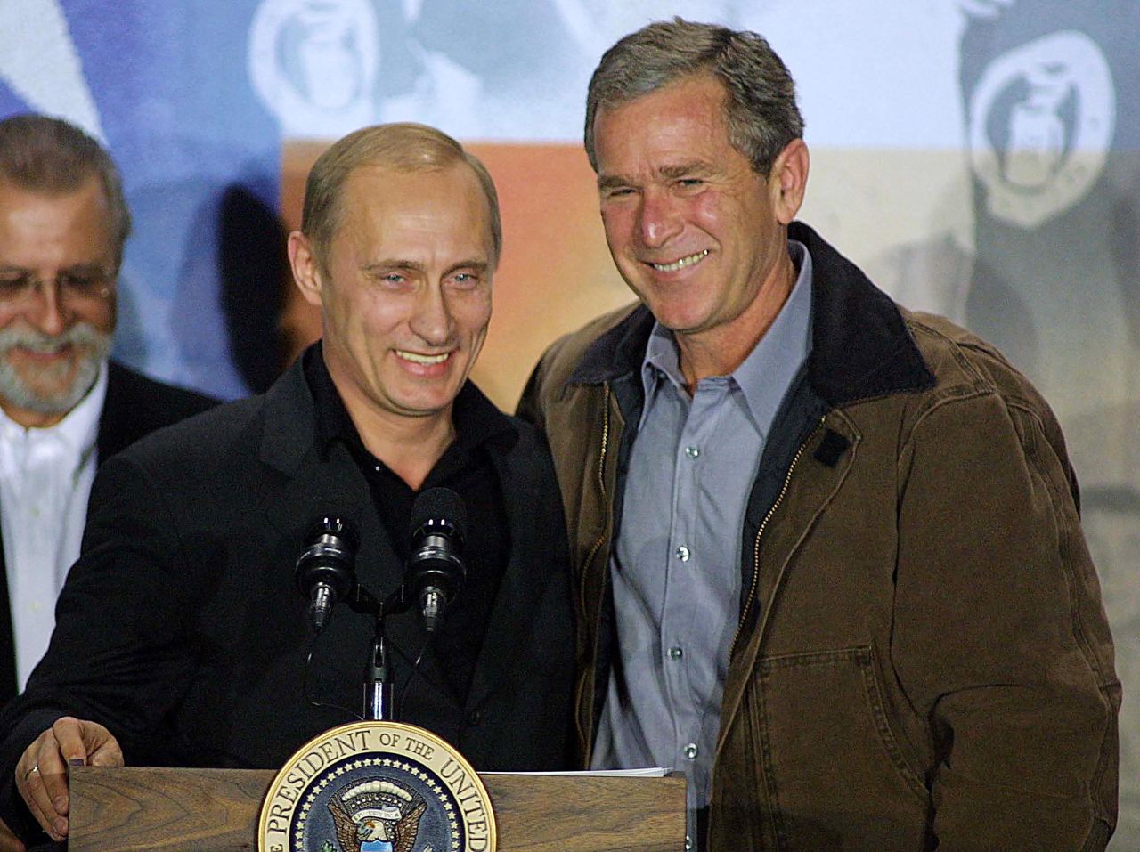 Putin and Bush smile after a news conference in Crawford, Texas, in 2001. Putin visited Bush's ranch in Crawford.