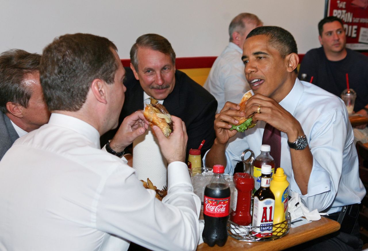 Obama and Medvedev eat cheeseburgers in Arlington, Virginia, in 2010. Earlier, they met in the White House Oval Office.