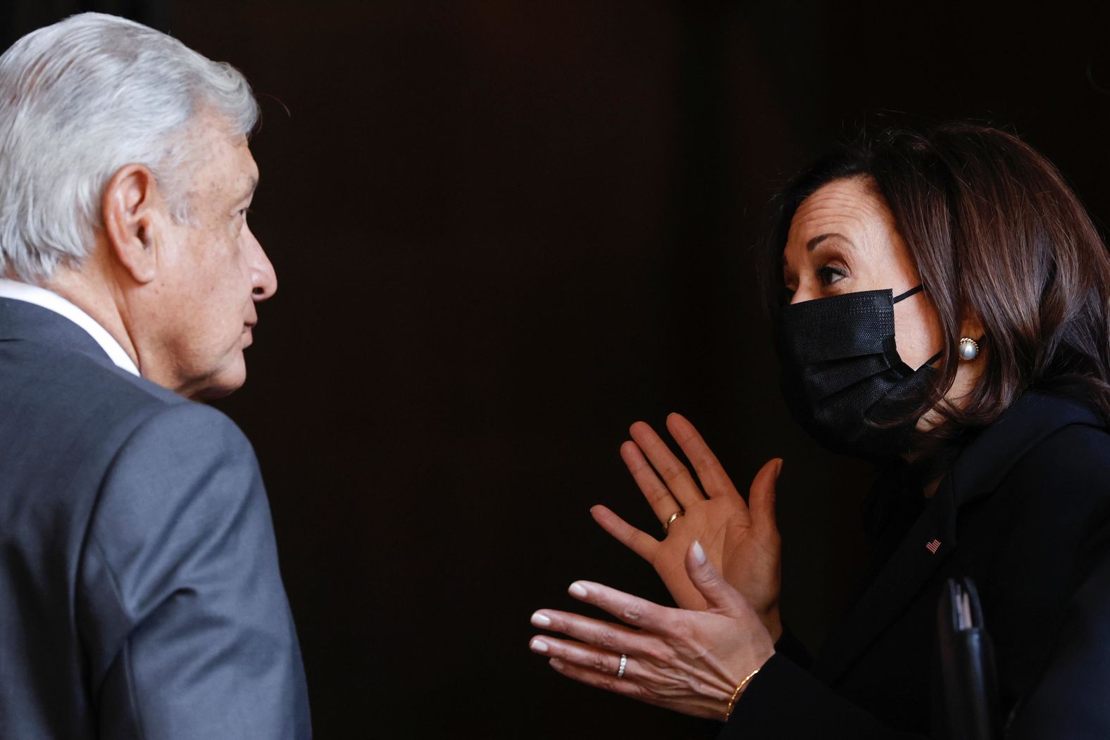 Harris and Lopez Obrador have a conversation after attending a signing ceremony at the National Palace.