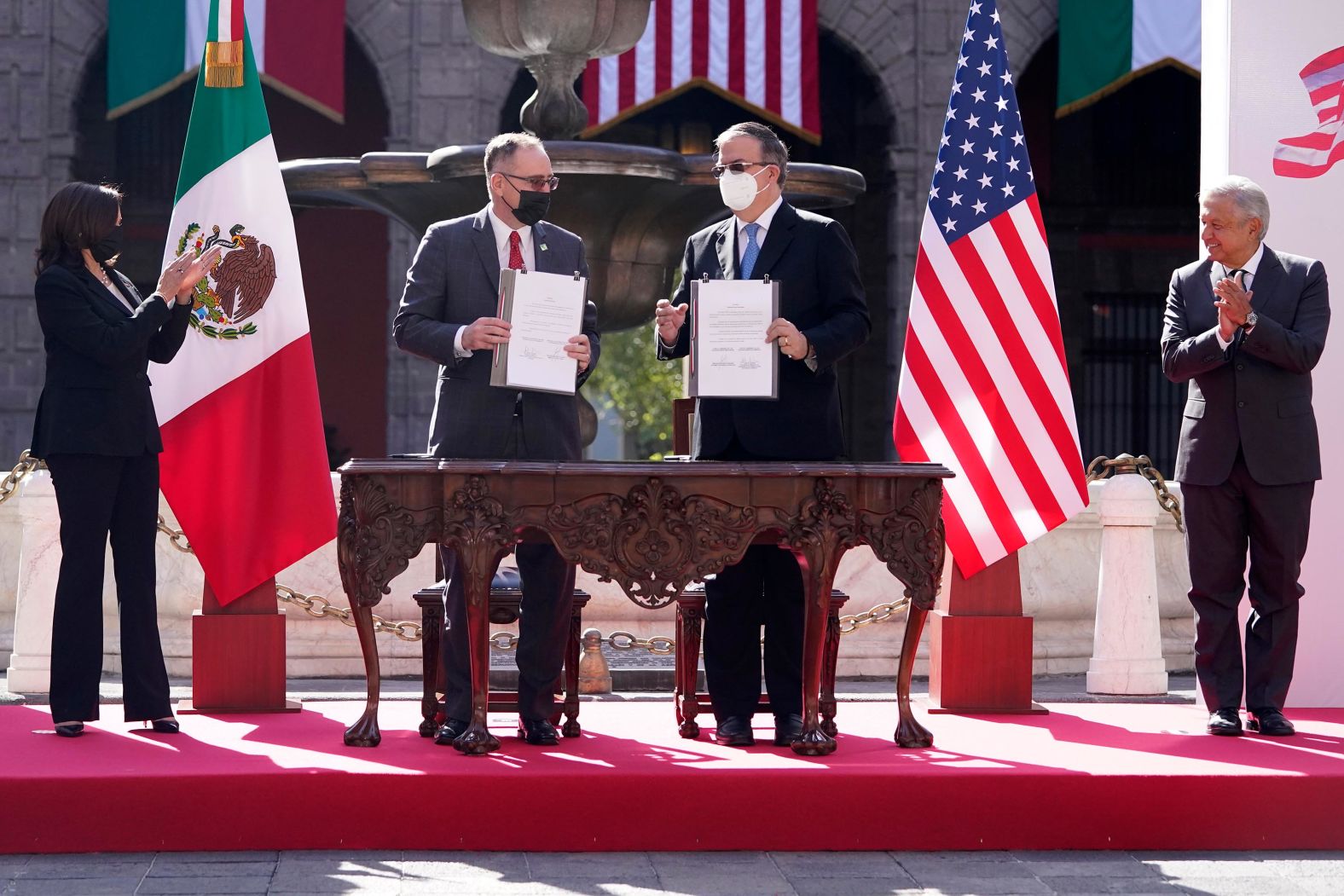 Harris attends a signing ceremony with the President of Mexico on Tuesday at the National Palace in Mexico City. Mexico's Foreign Minister Marcelo Ebrard Casaubon, and John Creamer, Chargé d'Affaires US Embassy signed a Memorandum of Understanding between the United States and Mexico to establish a strategic partnership to cooperate on development programs in the Northern Triangle.