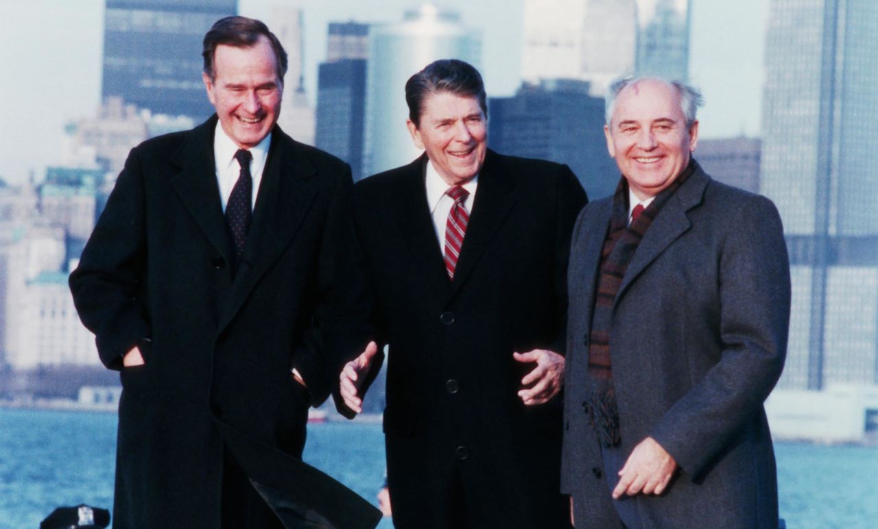 US Vice President George H.W. Bush, US President Ronald Reagan and Soviet leader Mikhail Gorbachev pose for a photo on Governors Island in New York in 1988.