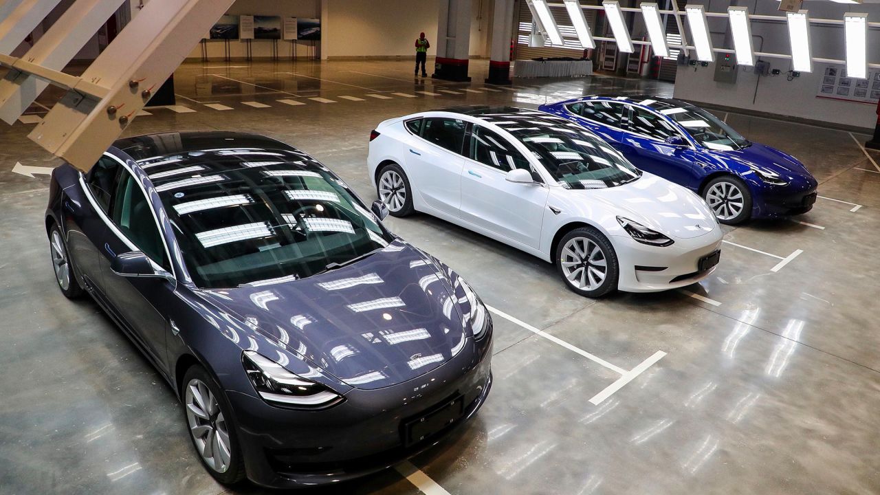 Tesla Model 3s are displayed in Shanghai. (STR/AFP via Getty Images)