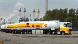 The Royal Dutch Shell Plc logo on fuel tanker trucks at the Shell Pernis refinery in Rotterdam, Netherlands, on Tuesday, April 27, 2021. Shell reports first quarter earnings on April 29. Photographer: Peter Boer/Bloomberg via Getty Images