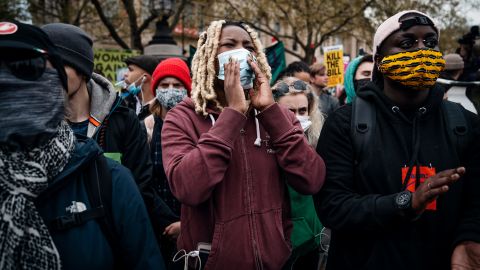 "I am getting quite a lot of threats online, but not just me -- other Black activists too," says BLM activist Aima (center).