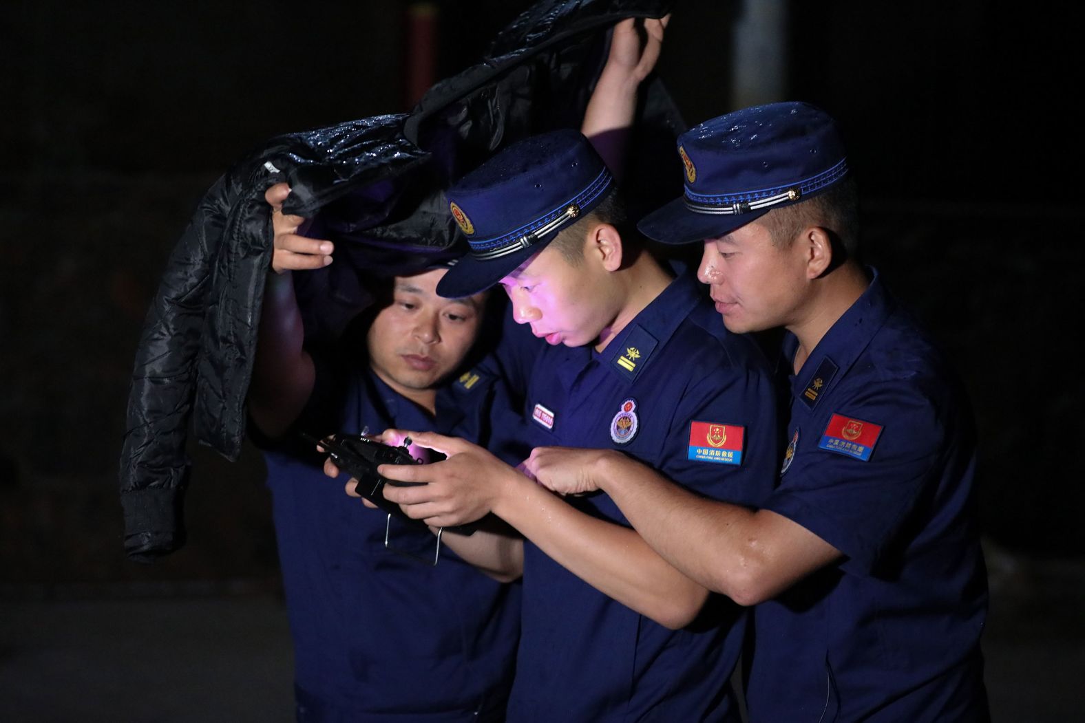 Officials use a drone to track the herd in Kunming, Yunnan province, on June 5.